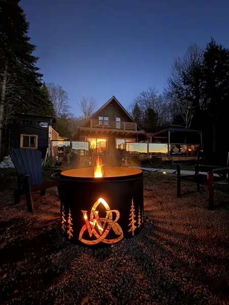 The Wilson Retreat fire pit at dusk