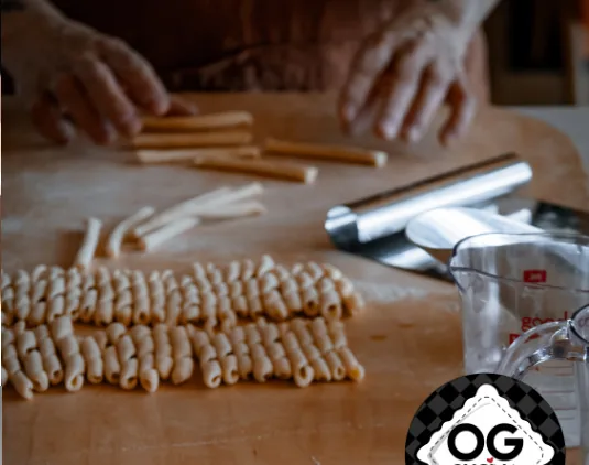 Fresh pasta being made by hand, from OG Cucina’s workshop brochure