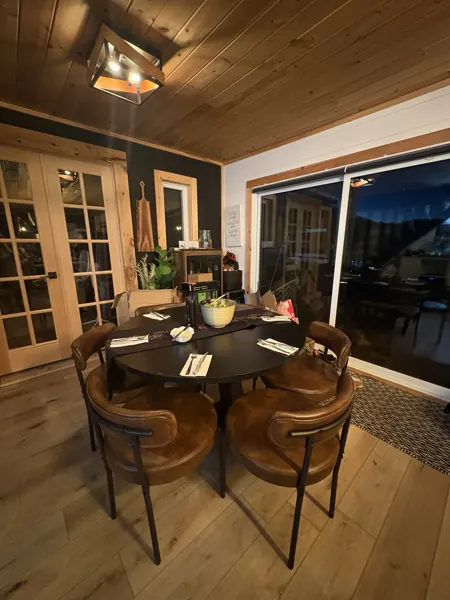 The dining table set for dinner